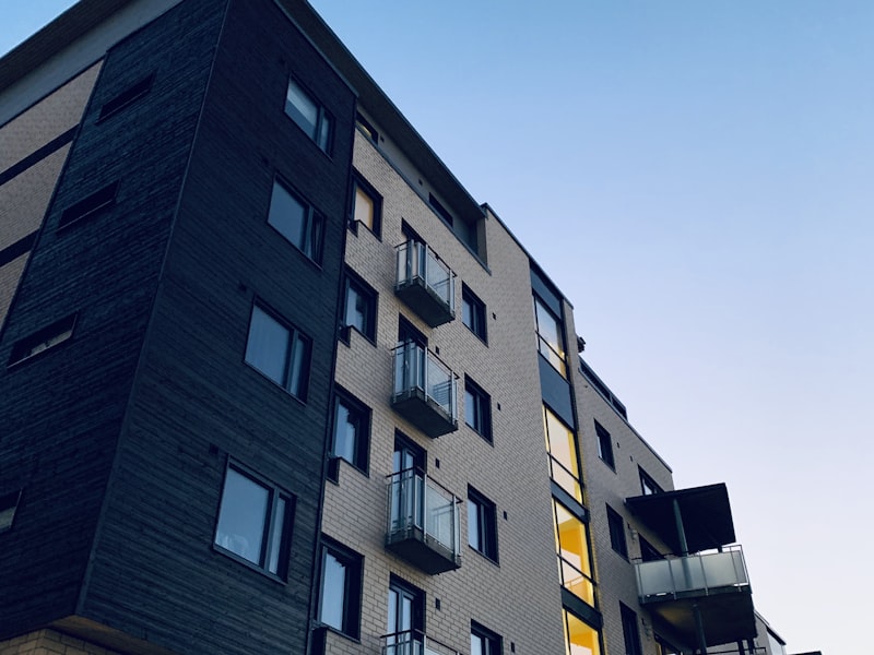 Plain office building exterior before green makeover